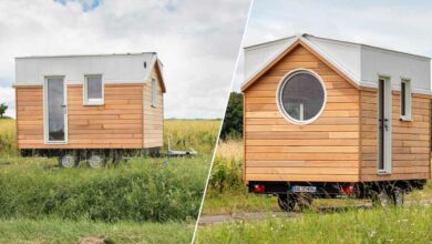 Une tiny house compacte et minimaliste avec un grand hublot.