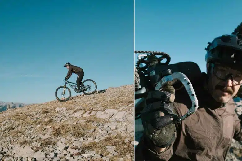 Un homme porte son VTT et fait une descente.